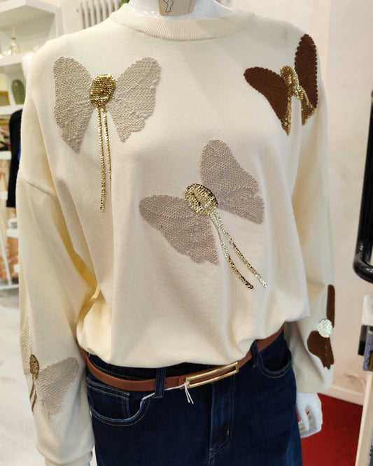 Maglia con fiocchi e paillettes