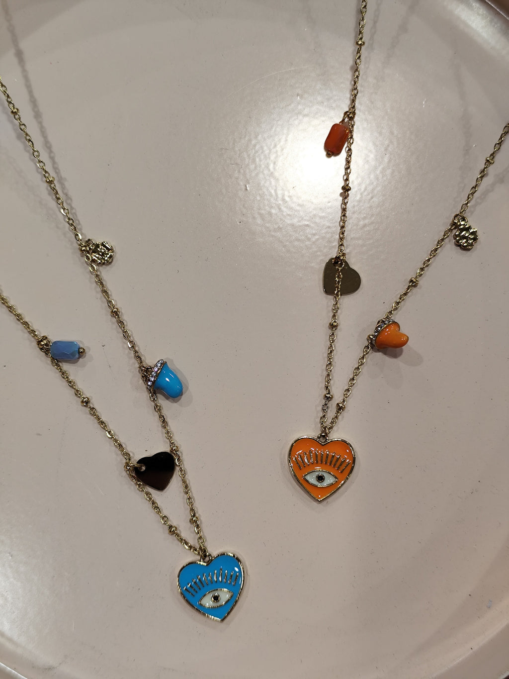 Collana occhio/cuore