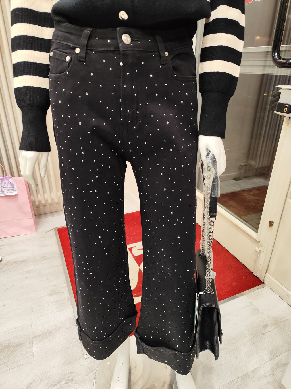 Jeans con risvolto e brillantini